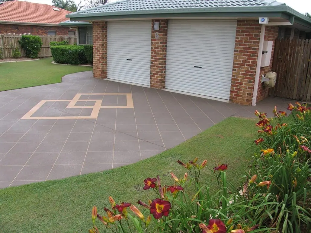 Stencilled concrete driveway with tile pattern and feature border