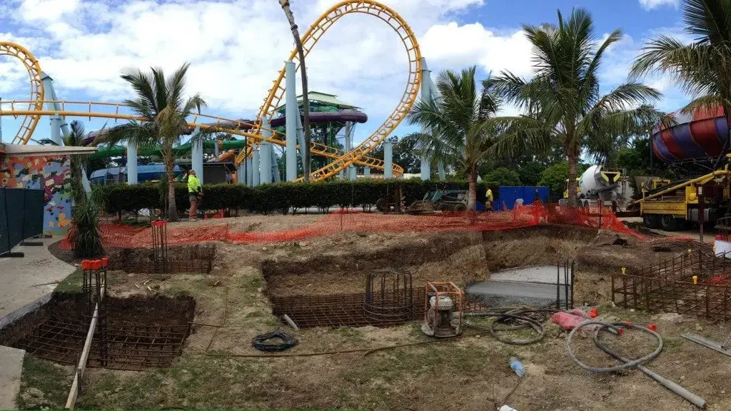 Commercial concrete footings with steel reinforcement cages ready to pour