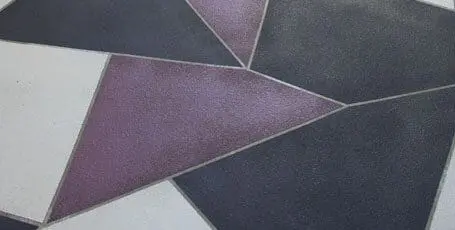 Geometric coloured concrete in plum, charcoal and white