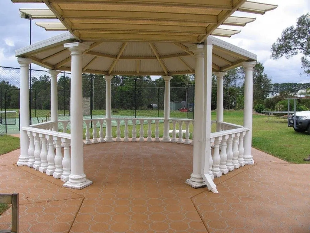 Garden rotunda floor resurfaced in a terracotta hexagon tile pattern