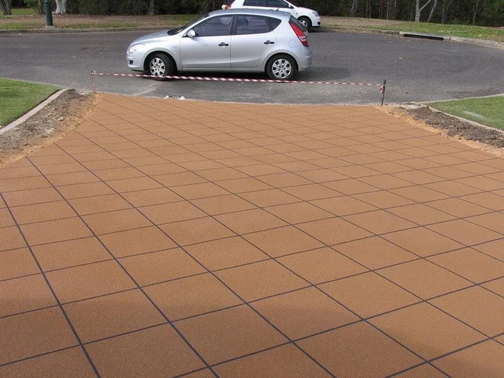 Driveway entry resurfaced in a terracotta tile pattern