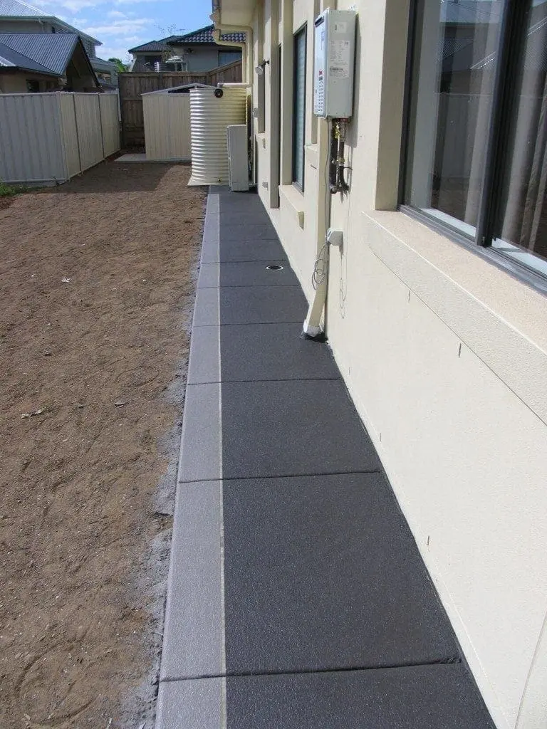 Side path resurfaced in charcoal with a grey border strip